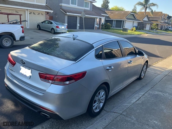 2016 Kia Optima LX with VIN 5XXGT4L38GG022940, listed as a Copart auction lot 54086785 with 145,038 mi miles and Clean Title. Bid and sale history available at carsss.com. Image 4.