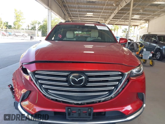 2017 Mazda CX-9 Grand Touring с VIN JM3TCADY6H0133052, выставлен на аукционе IAAI как лот 42269586 с пробегом 100 276 миль миль и . История ставок и продаж доступна на DreamBid. Изображение 13.