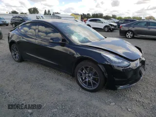 2023 Tesla Model 3 with VIN 5YJ3E1EA6PF454254, listed as a Copart auction lot 56881355 with 30,327 mi miles and Salvage title. Bid and sale history available at DreamBid. Image 4.