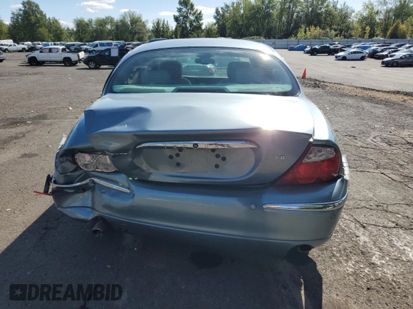 2003 Jaguar S-Type z VIN SAJEA01U53HM73131, wystawiony jako Copart lot #73430914 z przebiegiem 72 730 mil mil oraz Szkody całkowita. Historia ofert i sprzedaży dostępna na DreamBid. Obrazek 6.