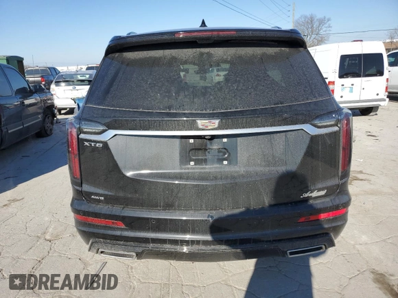2024 Cadillac XT6 AWD Sport with VIN 1GYKPGRS8RZ717573, listed as a Copart auction lot 89100805 with 27,417 mi miles and Salvage Title. Bid and sale history available at carsss.com. Image 6.