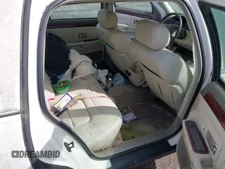 1999 Cadillac DeVille z VIN 1G6KD54Y5XU780836, wystawiony jako IAAI lot #41986180 z przebiegiem Nie podano mil oraz . Historia ofert i sprzedaży dostępna na DreamBid. Obrazek 8.