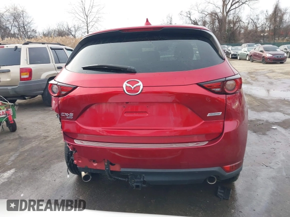 2018 Mazda CX-5 Grand Touring with VIN JM3KFBDM8J0406276, listed as a IAAI auction lot 41447355 with 70,772 mi miles. Bid and sale history available at carsss.com. Image 16.