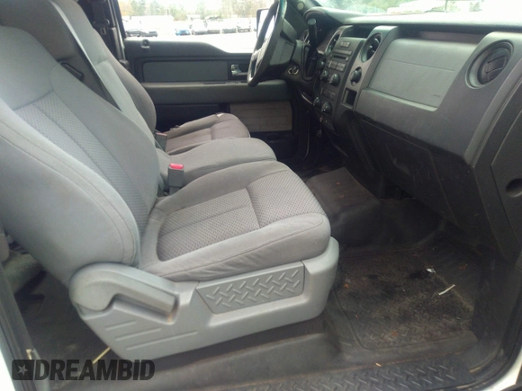 2014 Ford F-150 XL with VIN 1FTFX1EFXEKE16495, listed as a IAAI auction lot 41077199 with 206,212 mi miles. Bid and sale history available at carsss.com. Image 5.