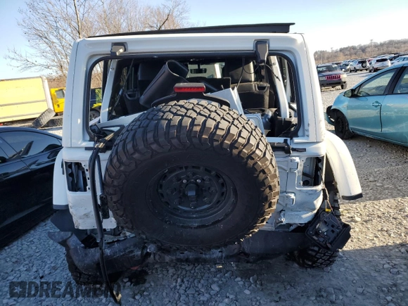 2022 Jeep Wrangler Unlimited Rubicon with VIN 1C4HJXFG6NW184670, listed as a Copart auction lot 84152964 with 31,459 mi miles and Salvage title. Bid and sale history available at DreamBid. Image 6.