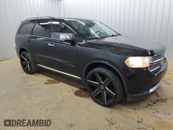 2013 Dodge Durango Citadel with VIN 1C4RDJEG2DC665090, listed as a Copart auction lot 51944065 with 144,983 mi miles and Clean Title. Bid and sale history available at carsss.com. Image 4.