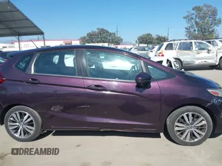 2015 Honda Fit EX-L z VIN 3HGGK5H80FM725959, wystawiony jako IAAI lot #42526513 z przebiegiem 110 885 mil mil oraz . Historia ofert i sprzedaży dostępna na DreamBid. Obrazek 13.