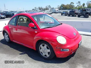 2000 Volkswagen Beetle GLS z VIN 3VWCC21C5YM446563, wystawiony jako IAAI lot #42317235 z przebiegiem 194 401 mil mil oraz . Historia ofert i sprzedaży dostępna na DreamBid. Obrazek 1.