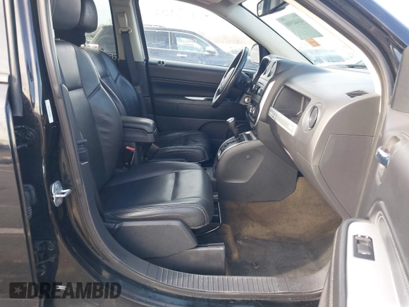 2016 Jeep Compass Latitude with VIN 1C4NJCEA5GD803959, listed as a IAAI auction lot 41443900 with 97,916 mi miles and . Bid and sale history available at DreamBid. Image 5.