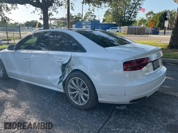 2017 Audi A8 Sport z VIN WAU43AFD7HN005619, wystawiony jako Copart lot #57526015 z przebiegiem 57 262 mil mil oraz Szkoda całkowita • Salvage title. Historia ofert i sprzedaży dostępna na DreamBid. Obrazek 3.