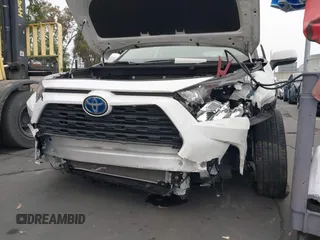 2019 Toyota RAV4 Hybrid LE z VIN JTMMWRFV9KD035204, wystawiony jako IAAI lot #42474855 z przebiegiem 29 916 mil mil oraz . Historia ofert i sprzedaży dostępna na DreamBid. Obrazek 6.