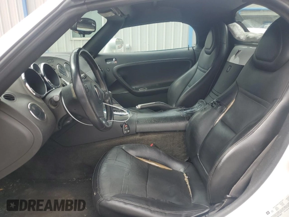 2008 Pontiac Solstice z VIN 1G2MB35B78Y104316, wystawiony jako Copart lot #58829185 z przebiegiem 194 147 mil mil oraz Tytuł czysty. Historia ofert i sprzedaży dostępna na DreamBid. Obrazek 7.