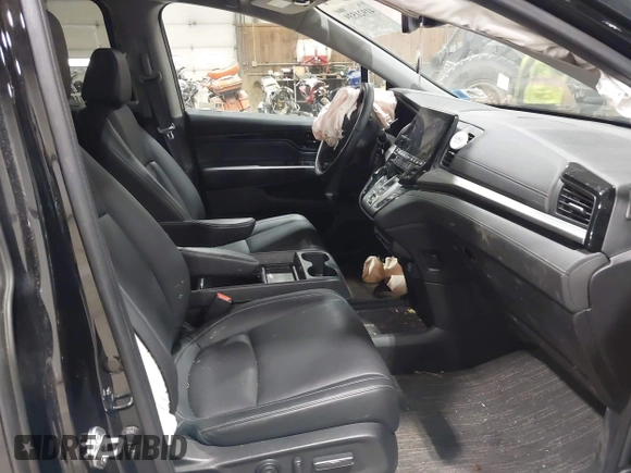 2024 Honda Odyssey Touring z VIN 5FNRL6H80RB044915, wystawiony jako IAAI lot #41921539 z przebiegiem 13 425 mil mil oraz . Historia ofert i sprzedaży dostępna na DreamBid. Obrazek 5.