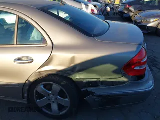 2003 Mercedes-Benz E 500 with VIN WDBUF70J83A095311, listed as a IAAI auction lot 41329473 with 133,401 mi miles and . Bid and sale history available at DreamBid. Image 6.