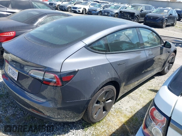 2022 Tesla Model 3 with VIN 5YJ3E1EA0NF344782, listed as a IAAI auction lot 41803469 with 16,973 mi miles and . Bid and sale history available at DreamBid. Image 4.