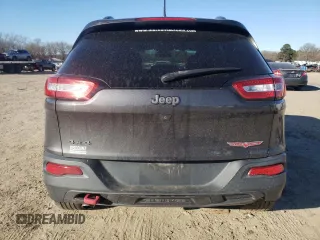 2017 Jeep Cherokee Trailhawk L Plus with VIN 1C4PJMBB5HW537036, listed as a Copart auction lot 42031035 with 115,732 mi miles and Salvage Title. Bid and sale history available at carsss.com. Image 6.