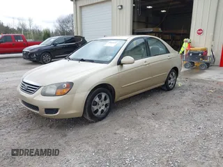 2009 Kia Spectra EX with VIN KNAFE221795665455, listed as a IAAI auction lot 41826035 with 163,073 mi miles. Bid and sale history available at carsss.com. Image 2.