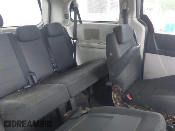 2009 Dodge Grand Caravan SE z VIN 2D8HN44E59R585342, wystawiony jako IAAI lot #42241676 z przebiegiem 329 636 mil mil oraz . Historia ofert i sprzedaży dostępna na DreamBid. Obrazek 8.