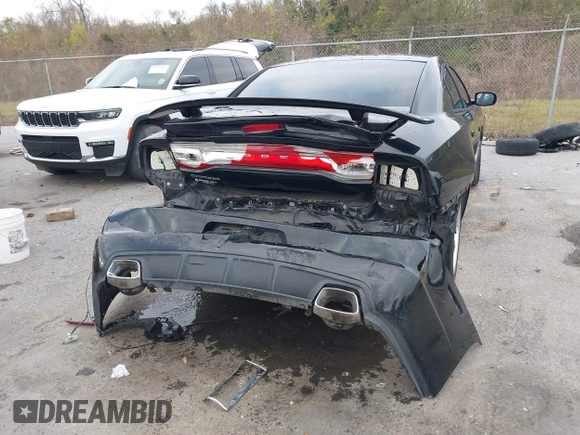 2014 Dodge Charger SE with VIN 2C3CDXBG2EH187978, listed as a IAAI auction lot 41246875 with 106,635 mi miles and . Bid and sale history available at DreamBid. Image 6.