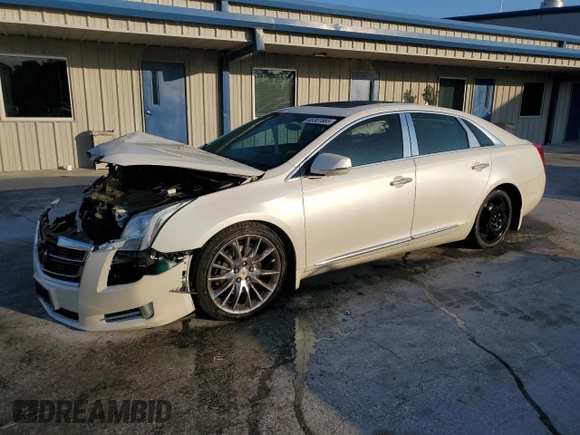 2014 Cadillac XTS Platinum z VIN 2G61W5S84E9153242, wystawiony jako Copart lot #88361685 z przebiegiem 141 401 mil mil oraz Szkoda całkowita • Salvage title. Historia ofert i sprzedaży dostępna na DreamBid. Obrazek 1.