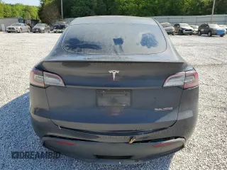 2024 Tesla Model Y Performance z VIN 7SAYGDEF1RF038664, wystawiony jako Copart lot #52583175 z przebiegiem Nie podano mil oraz Szkoda całkowita • Salvage title. Historia ofert i sprzedaży dostępna na DreamBid. Obrazek 6.