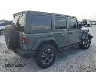 2019 Jeep Wrangler Unlimited Sport S with VIN 1C4HJXDG3KW583521, listed as a Copart auction lot 62835915 with 115,292 mi miles and Salvage title. Bid and sale history available at DreamBid. Image 3.