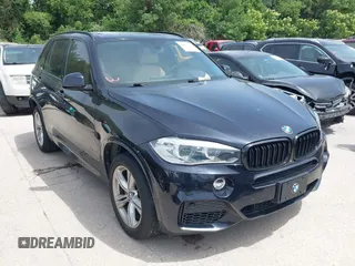 2014 BMW X5 xDrive50i z VIN 5UXKR6C55E0C03743, wystawiony jako IAAI lot #42268302 z przebiegiem 118 892 mil mil oraz . Historia ofert i sprzedaży dostępna na DreamBid. Obrazek 1.
