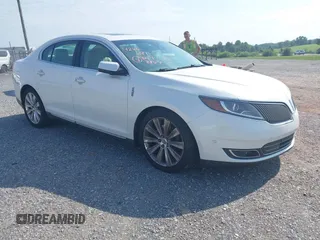 2013 Lincoln MKS EcoBoost with VIN 1LNHL9FT4DG614140, listed as a IAAI auction lot 42866991 with 126,487 mi miles and . Bid and sale history available at DreamBid. Image 1.