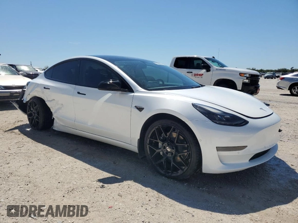 2022 Tesla Model 3 with VIN 5YJ3E1EA0NF108956, listed as a Copart auction lot 50066235 with 35,180 mi miles and Non Repairable. Bid and sale history available at DreamBid. Image 4.