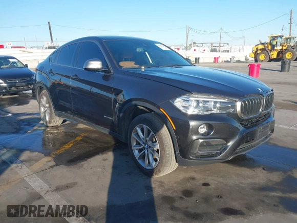 2019 BMW X6 sDrive35i z VIN 5UXKU0C57K0S97581, wystawiony jako IAAI lot #41322568 z przebiegiem 76 635 mil mil oraz . Historia ofert i sprzedaży dostępna na DreamBid. Obrazek 1.