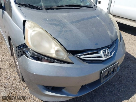 2009 Honda Fit Sport w/Navi with VIN JHMGE88619S020572, listed as a IAAI auction lot 41755126 with 202,358 mi miles. Bid and sale history available at carsss.com. Image 6.