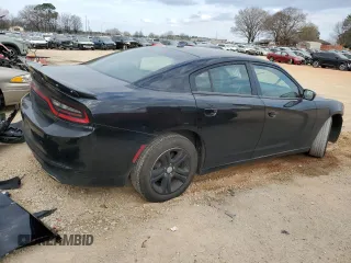 2021 Dodge Charger SXT with VIN 2C3CDXBG6MH522285, listed as a Copart auction lot 48901915 with 94,561 mi miles and Salvage Title. Bid and sale history available at carsss.com. Image 3.