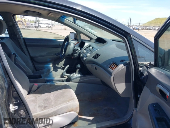 2007 Honda Civic Sdn LX with VIN 1HGFA16507L126952, listed as a IAAI auction lot 42104129 with 182,111 mi miles. Bid and sale history available at carsss.com. Image 5.