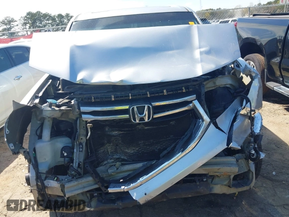 2013 Honda Pilot EX-L with VIN 5FNYF3H59DB022797, listed as a IAAI auction lot 41880675 with 206,359 mi miles and . Bid and sale history available at DreamBid. Image 6.