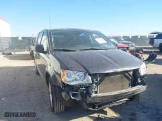 2018 Dodge Grand Caravan SE with VIN 2C4RDGBG3JR348560, listed as a IAAI auction lot 41657312 with 135,007 mi miles. Bid and sale history available at carsss.com. Image 1.