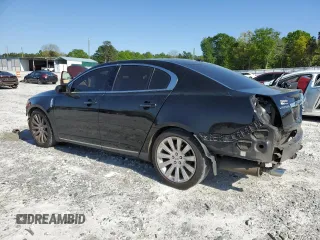 2011 Lincoln MKS with VIN 1LNHL9DR7BG615397, listed as a Copart auction lot 52047015 with 111,720 mi miles and Salvage Title. Bid and sale history available at DreamBid. Image 2.