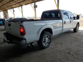 2011 Ford F-250 XL with VIN 1FT7W2AT8BEC35849, listed as a Copart auction lot 52497815 with 210,924 mi miles and Salvage title. Bid and sale history available at DreamBid. Image 3.