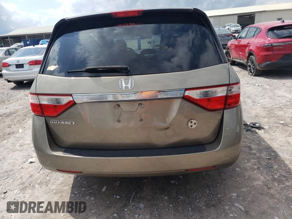 2012 Honda Odyssey LX с VIN 5FNRL5H29CB081071, выставлен на аукционе Copart как лот 56751545 с пробегом 233 240 миль миль и Списание • Salvage title. История ставок и продаж доступна на DreamBid. Изображение 6.