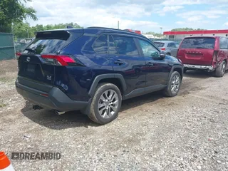 2024 Toyota RAV4 XLE Premium with VIN 2T3A1RFV4RW411404, listed as a IAAI auction lot 42342453 with 20,741 mi miles and . Bid and sale history available at DreamBid. Image 4.