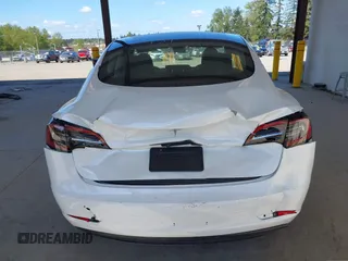 2023 Tesla Model 3 with VIN 5YJ3E1EA5PF610431, listed as a IAAI auction lot 42087181 with 19,777 mi miles and . Bid and sale history available at carsss.com. Image 16.