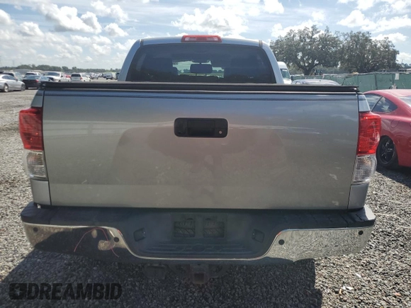 2012 Toyota Tundra 4WD Truck LTD with VIN 5TFHY5F15CX238124, listed as a Copart auction lot 69297994 with 165,591 mi miles and Salvage Title. Bid and sale history available at carsss.com. Image 6.