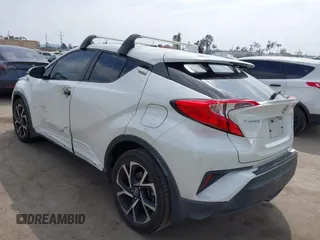 2019 Toyota C-HR XLE with VIN JTNKHMBX9K1054053, listed as a IAAI auction lot 42120256 with 67,083 mi miles and . Bid and sale history available at DreamBid. Image 3.