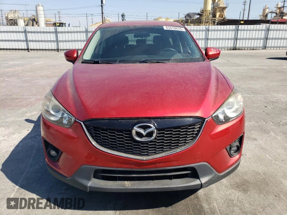 2014 Mazda CX-5 Touring with VIN JM3KE2CY9E0356050, listed as a Copart auction lot 65470674 with 70,400 mi miles and Salvage Title. Bid and sale history available at DreamBid. Image 5.