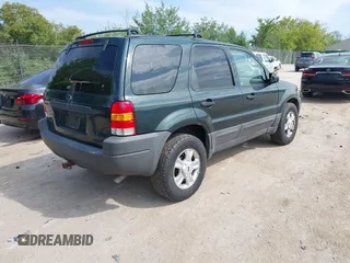 2004 Ford Escape XLT with VIN 1FMYU93124DA08711, listed as a IAAI auction lot 42798957 with 231,771 mi miles and . Bid and sale history available at DreamBid. Image 4.