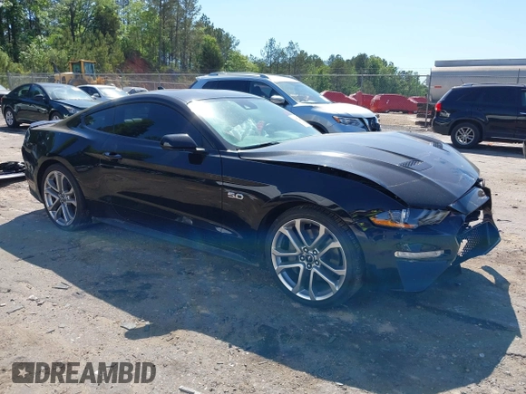 2021 Ford Mustang GT z VIN 1FA6P8CFXM5156002, wystawiony jako IAAI lot #42009222 z przebiegiem 65 939 mil mil oraz . Historia ofert i sprzedaży dostępna na DreamBid. Obrazek 1.