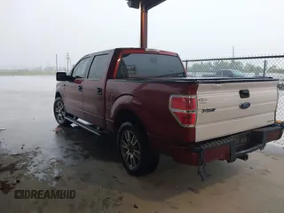 2014 Ford F-150 XL with VIN 1FTFW1CF1EKD58198, listed as a IAAI auction lot 42086106 with 401,943 mi miles. Bid and sale history available at carsss.com. Image 3.