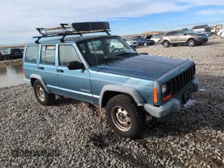 1999 Jeep Cherokee SE with VIN 1J4FF28S5XL646812, listed as a Copart auction lot 87951115 with 230,161 mi miles and Clean title. Bid and sale history available at DreamBid. Image 4.