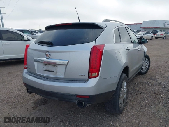 2013 Cadillac SRX z VIN 3GYFNAE38DS568509, wystawiony jako IAAI lot #41199017 z przebiegiem 137 267 mil mil oraz . Historia ofert i sprzedaży dostępna na DreamBid. Obrazek 4.