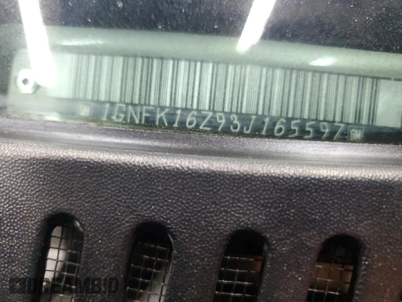2003 Chevrolet Suburban LT z VIN 1GNFK16Z93J165597, wystawiony jako Copart lot #52101725 z przebiegiem 285 014 mil mil oraz Szkoda całkowita • Salvage title. Historia ofert i sprzedaży dostępna na DreamBid. Obrazek 13.