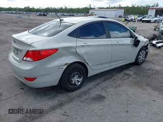 2016 Hyundai Accent SE z VIN KMHCT4AE4GU110456, wystawiony jako IAAI lot #42203494 z przebiegiem 97 409 mil mil oraz . Historia ofert i sprzedaży dostępna na DreamBid. Obrazek 4.
